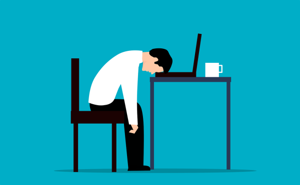 Animated image of exhausted employee at their desk